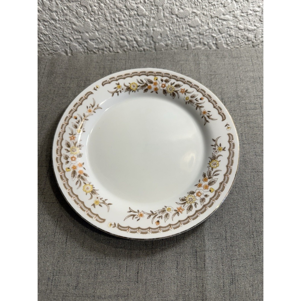 Haicheng China 7" Plate.‎ Brown, Yellow, Orange And White Floral.